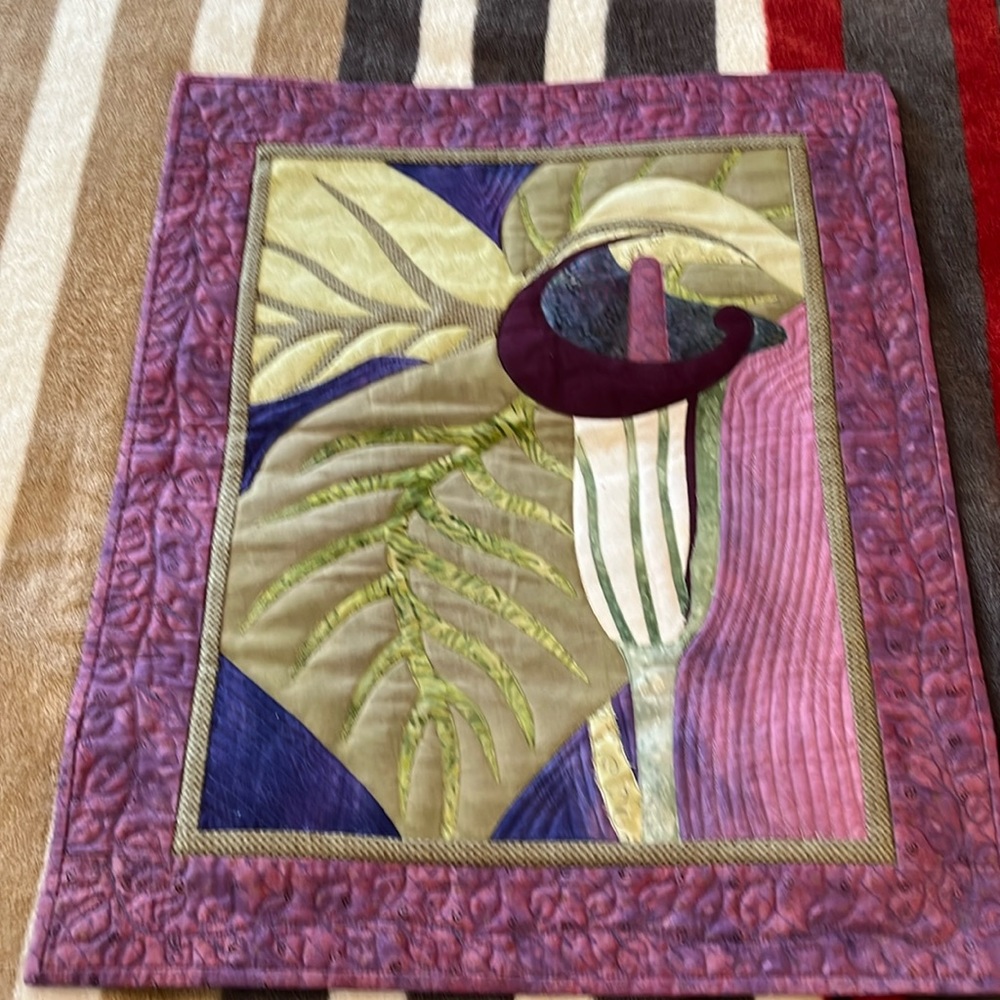 Homemade quilted wall hanging.